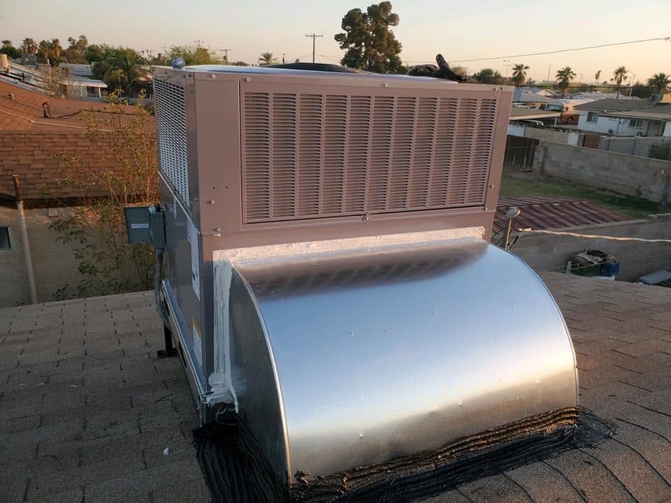 Completed rooftop packaged HVAC installation with sheet-metal ductwork